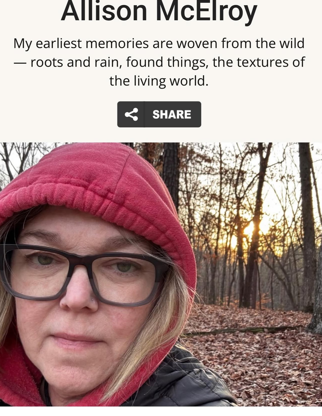 Profile card for artist Allison McElroy with a quote about her early memories of nature, above a photo of her in a red hooded jacket standing in autumn woods at sunset.